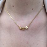 Colar Três Trevos Dourado Aço Inox.