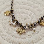 Pulseira Preta Com Figuras Douradas Aço Inox